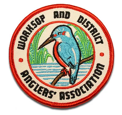 Embroidered woven badges