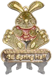 Bespoke glitter enamel medal shaped like a bunny with gold glitter