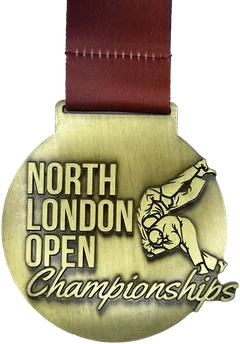 Antique gold non enamel medal with a maroon ribbon, North London Open Championships with a judo design