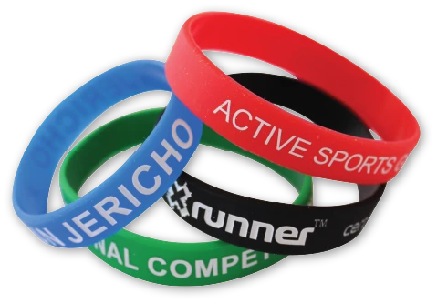 Custom silicone wristbands in red, blue, green and black with printed text