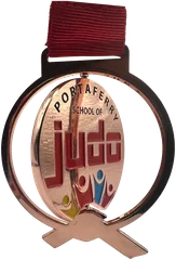 Bespoke spinner medal with a spinning Portaferry School of Judo centre on a red ribbon