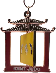 Bespoke pagoda-shaped spinner medal with a spinning yellow centre for Kent Judo