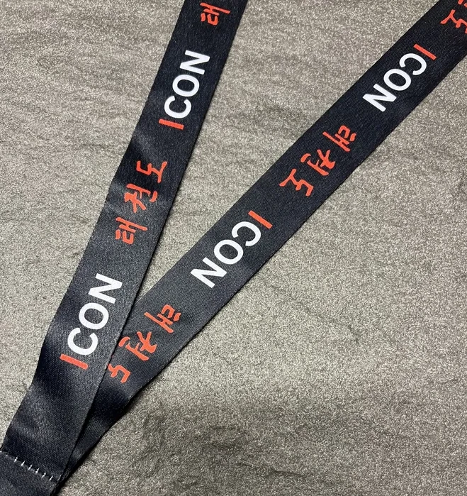 Black ICON ribbon with red and white lettering