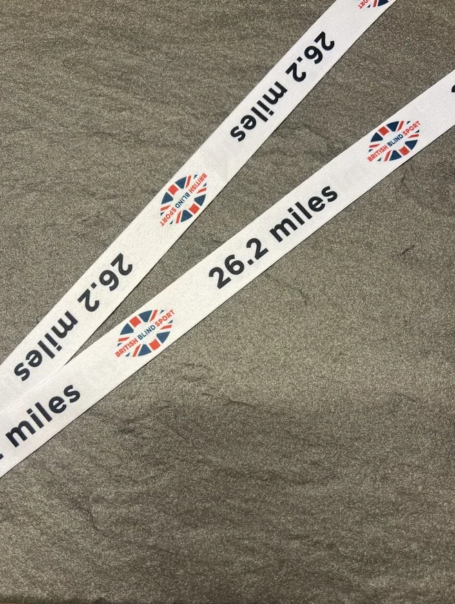 26.2 miles with British Blind Sport logos on a white sublimation ribbon